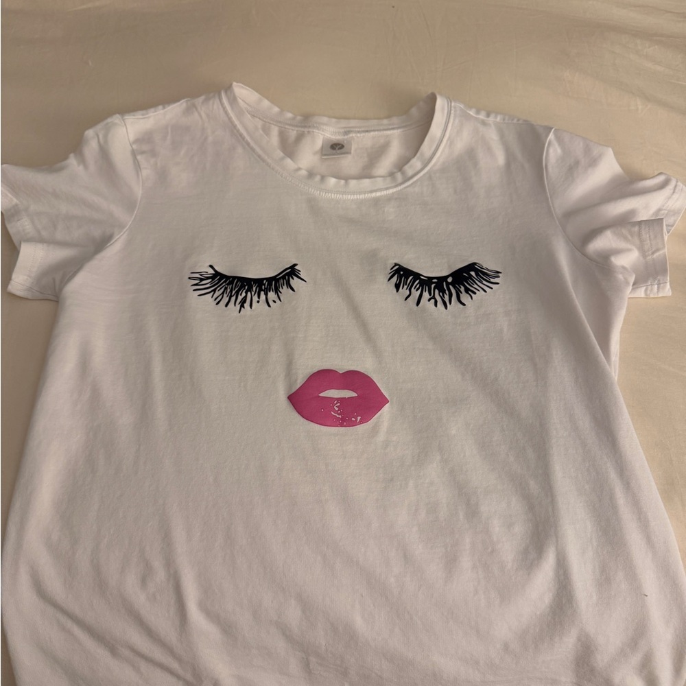 Women Makeup Graphic Tee with Pink Lips and Black Lashes